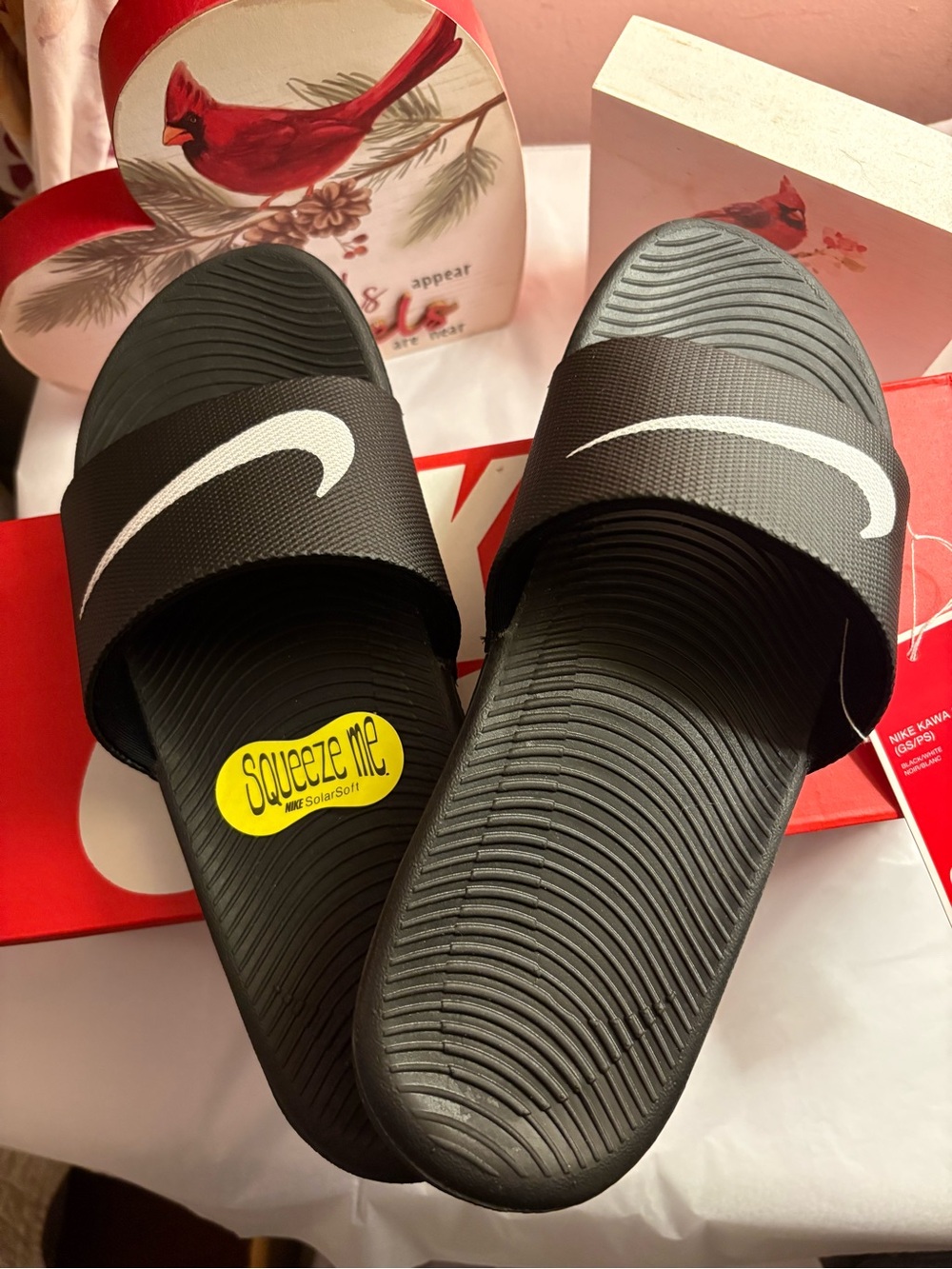 Big Kids Nike Black Slide Sandals with White Swoosh Accent in size 6Y